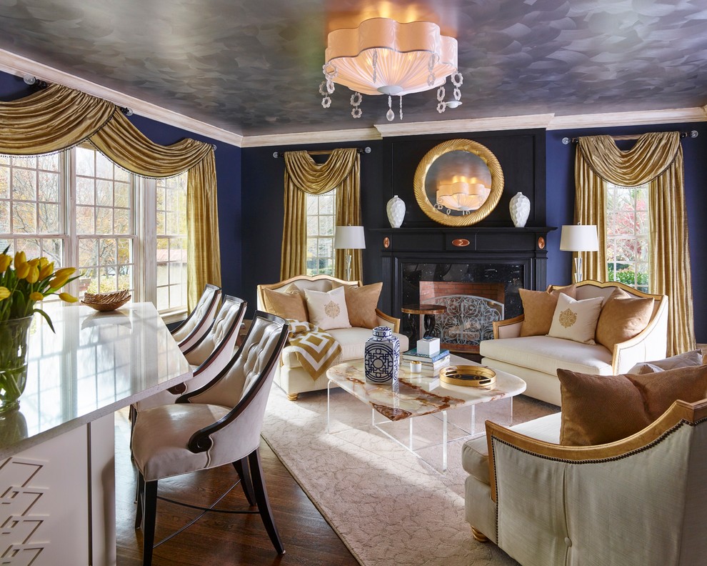 Design ideas for an eclectic living room in Philadelphia with a home bar, blue walls, medium hardwood floors, a standard fireplace, a wood fireplace surround and no tv.