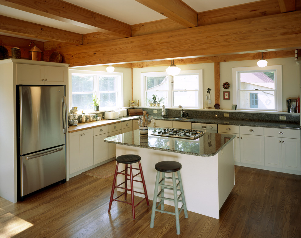 Inspiration for a country kitchen in Boston with stainless steel appliances.