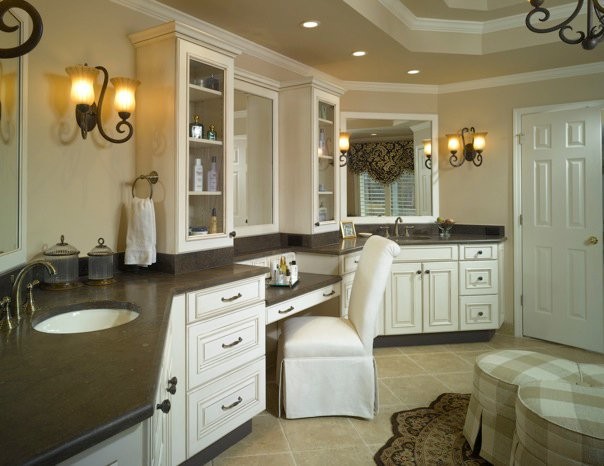Design ideas for a large contemporary master bathroom in Atlanta with raised-panel cabinets, white cabinets, beige walls, cement tiles, a drop-in sink, laminate benchtops and beige floor.