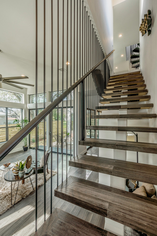 Inspiration for an industrial staircase remodel in Austin