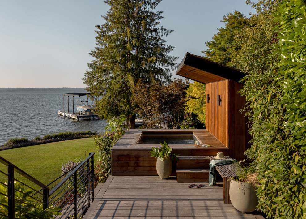 1950s rectangular hot tub photo in Seattle with decking