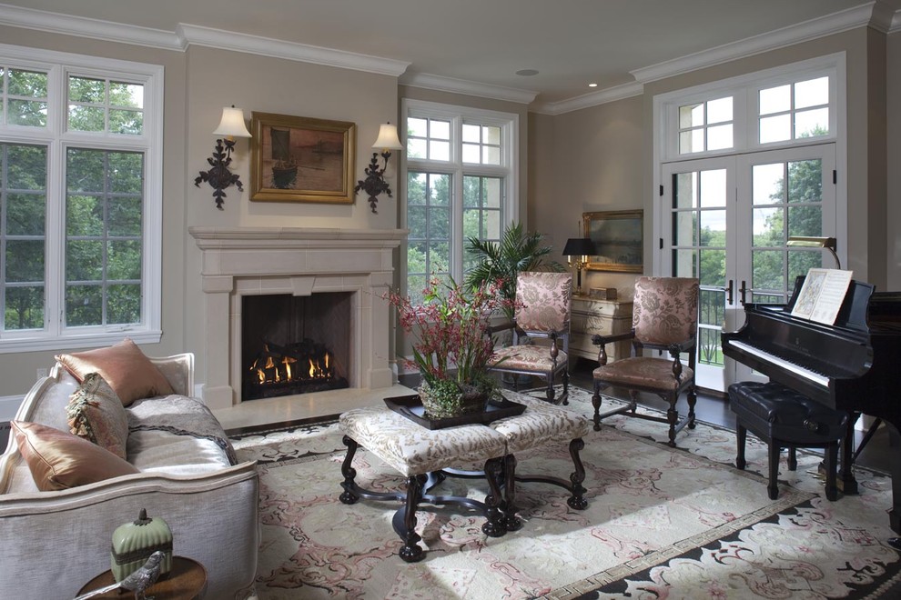 This is an example of a traditional family room in Minneapolis with a music area, beige walls, a standard fireplace and no tv.