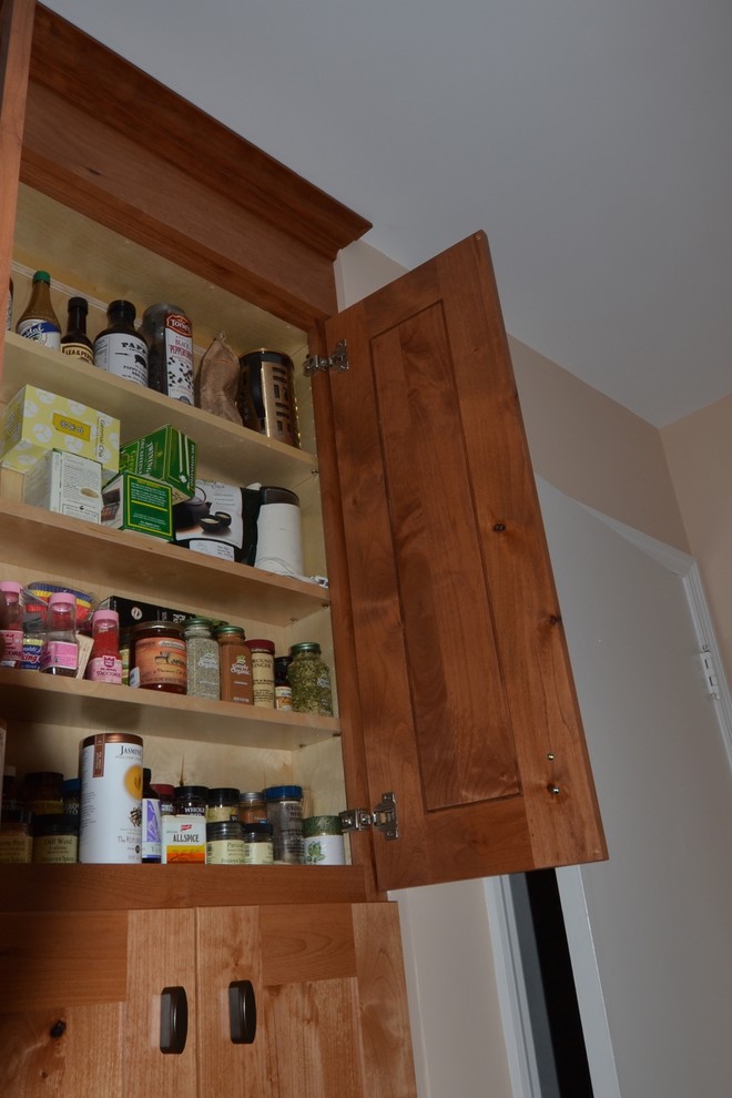 Kitchen with knotty alder cabinets