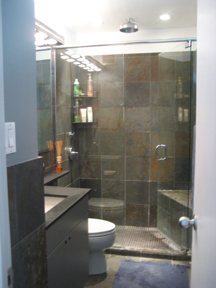 Photo of a small contemporary master bathroom in Chicago with an undermount sink, flat-panel cabinets, grey cabinets, concrete benchtops, an open shower, a one-piece toilet, multi-coloured tile, stone tile, white walls and slate floors.