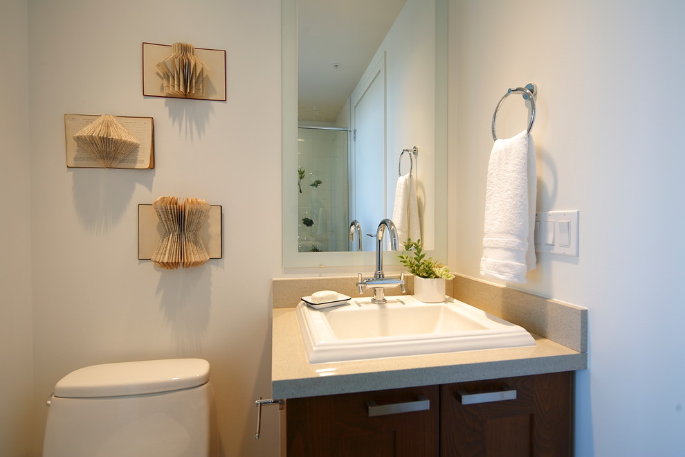 This is an example of a contemporary bathroom in Calgary with a drop-in sink.