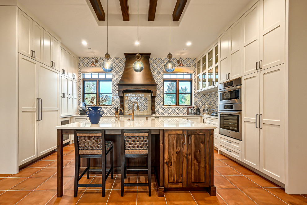 Example of a mountain style kitchen design in Denver