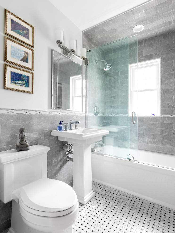 Inspiration for a small transitional bathroom in Boston with an alcove tub, an alcove shower, gray tile, porcelain tile, grey walls, marble floors, a pedestal sink, multi-coloured floor and a sliding shower screen.