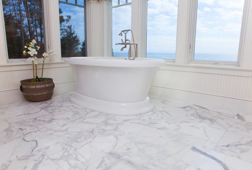 Freestanding bathtub - large transitional master marble floor and gray floor freestanding bathtub idea in Boston with white walls