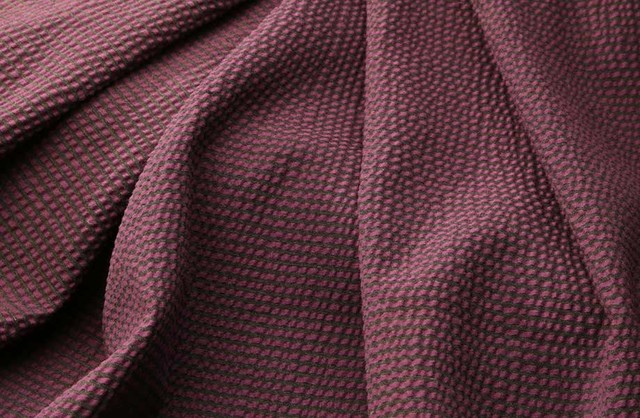 Repousse Upholstery Fabric in Plum