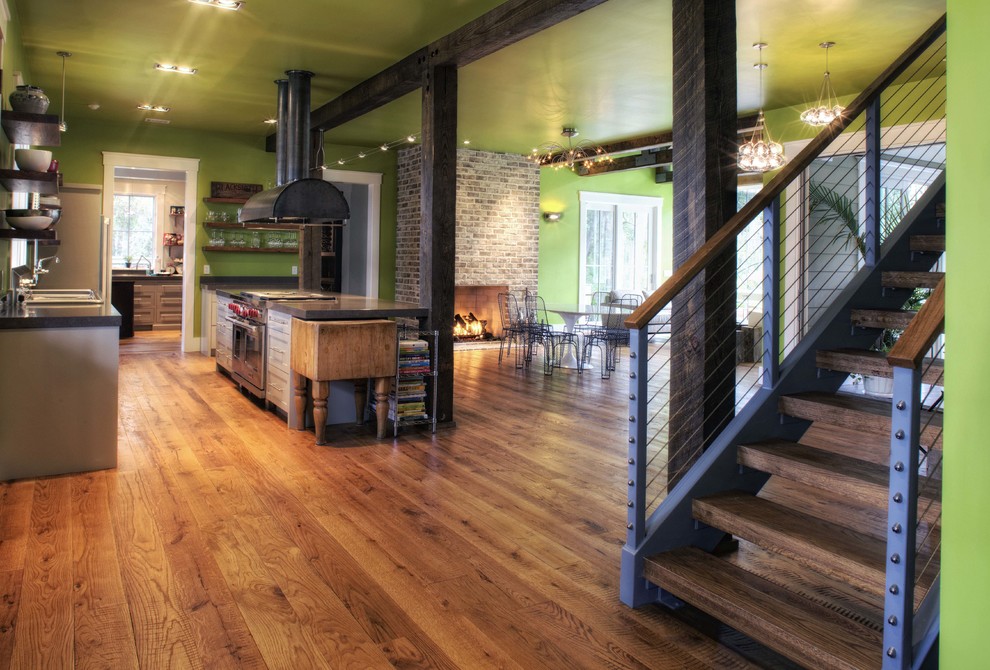 Inspiration for a large country wood straight staircase in Atlanta with metal risers.