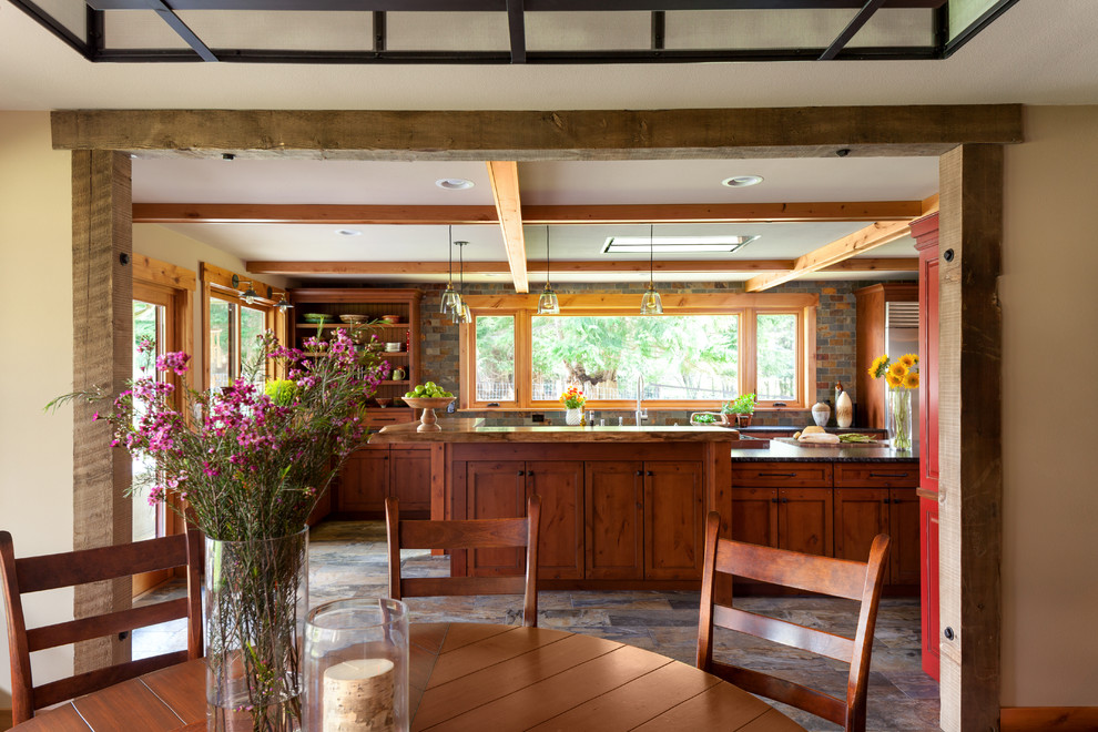Mid-sized country open plan dining in Seattle with beige walls, porcelain floors and grey floor.