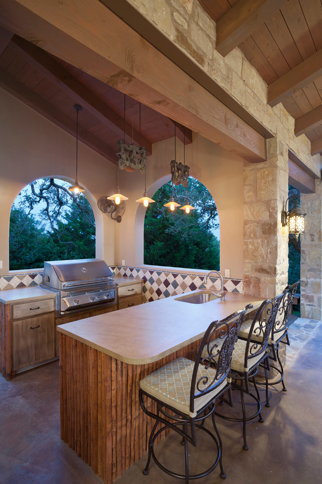 Photo of a mid-sized mediterranean patio in Austin.