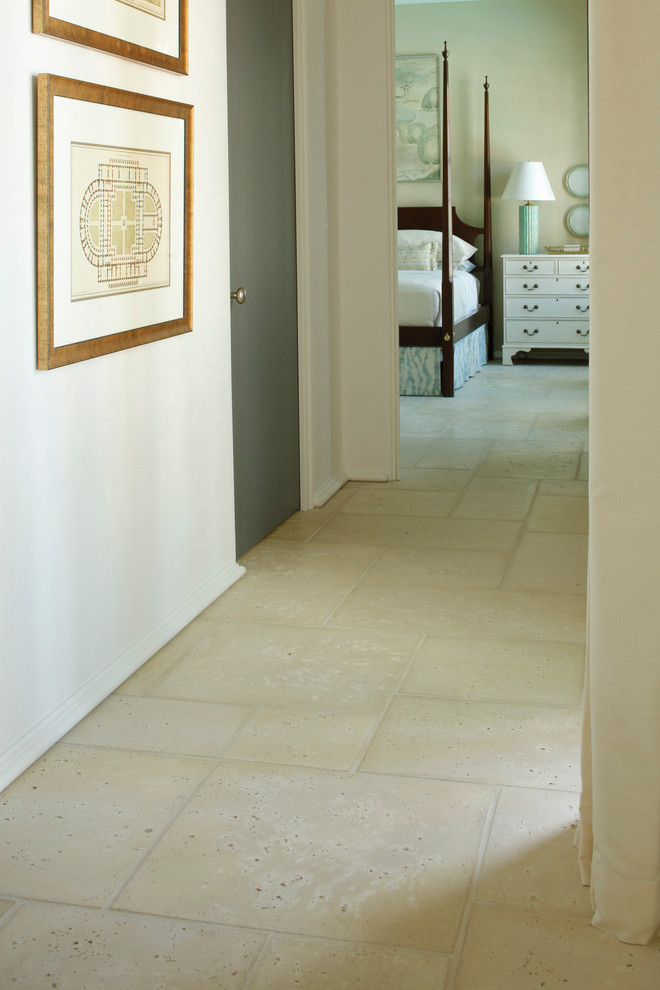 Design ideas for a transitional hallway in Miami with concrete floors.