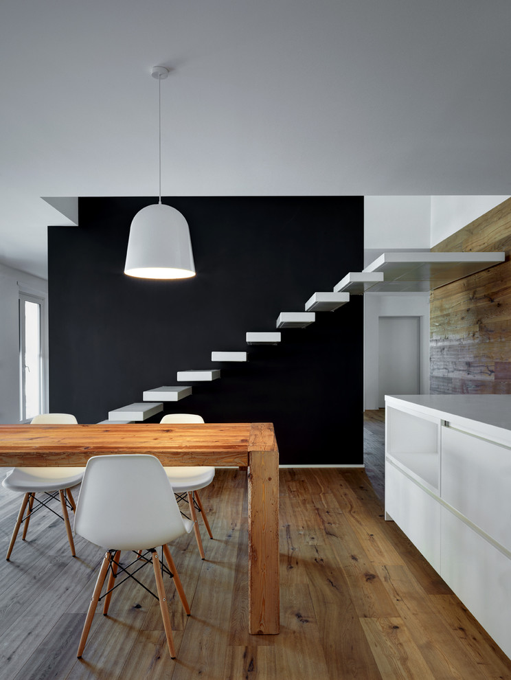 This is an example of a mid-sized contemporary straight staircase in Milan.