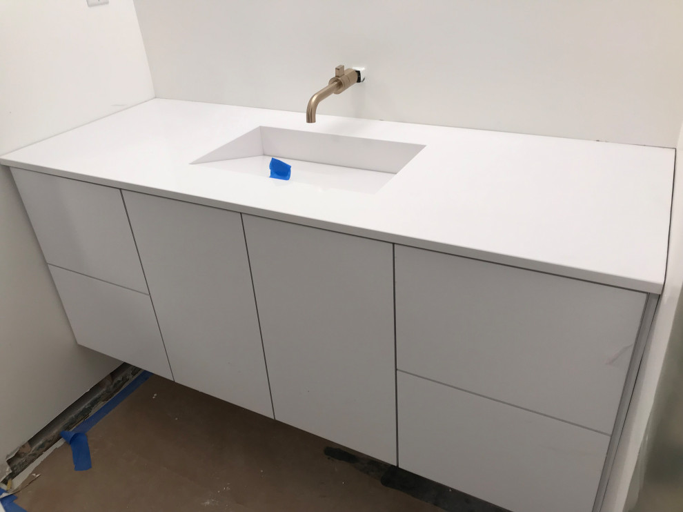 Wallmounted faucet height in bathroom?