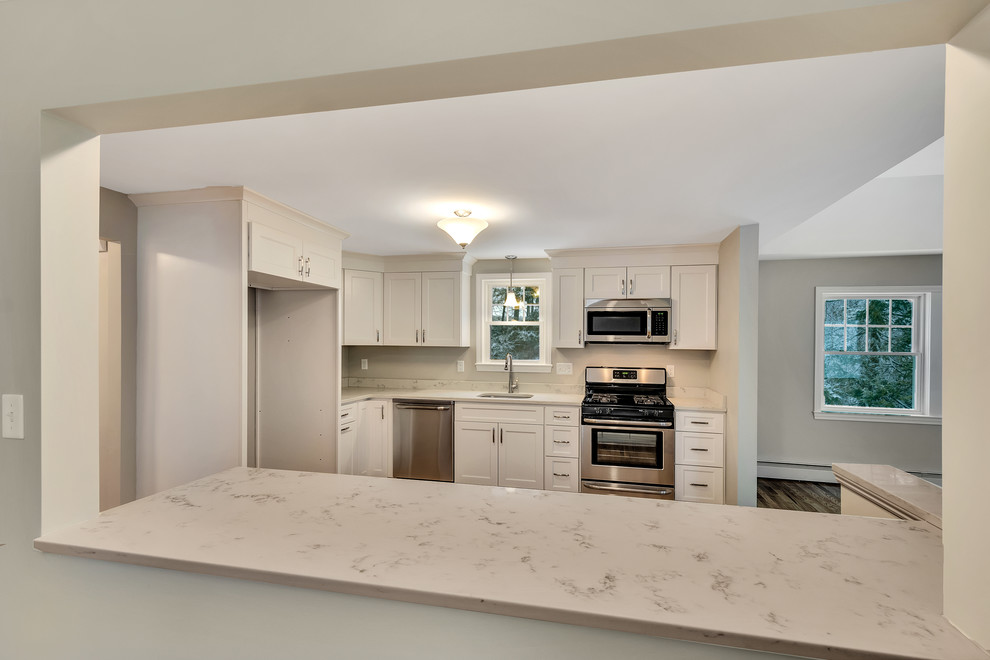 Example of a transitional kitchen design in Boston
