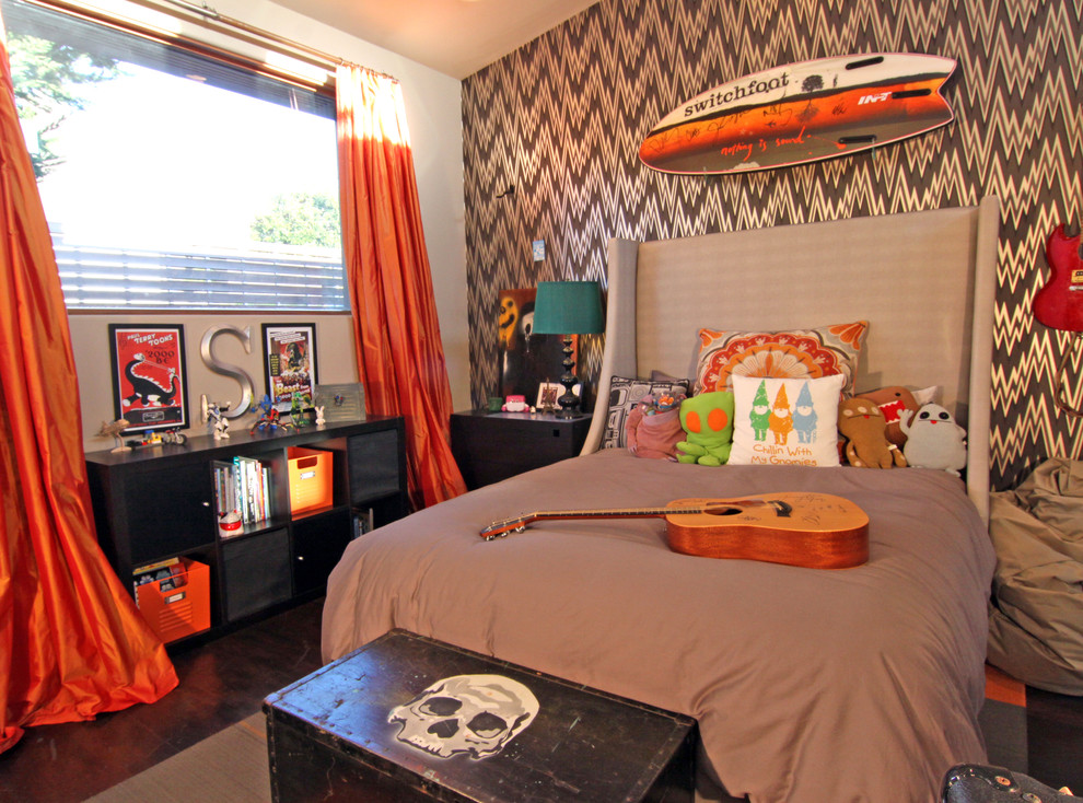 Photo of an eclectic kids' room for boys in San Diego with dark hardwood floors.