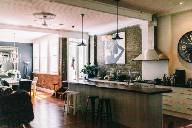 Inspiration for an expansive eclectic galley open plan kitchen in Newcastle - Maitland with flat-panel cabinets, white cabinets, white splashback, medium hardwood floors and with island.