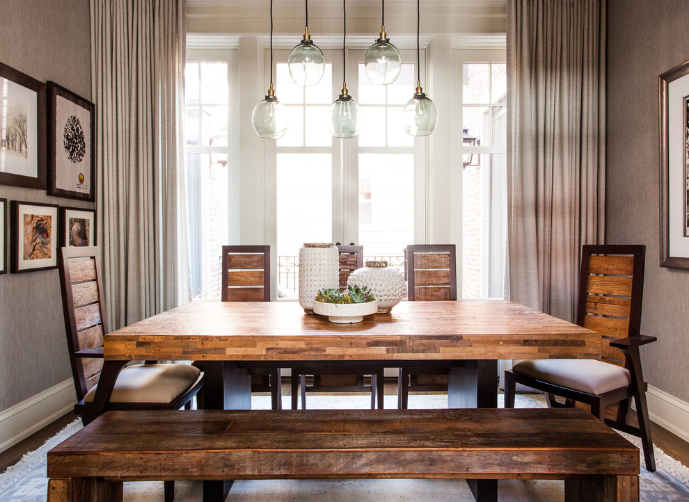 Mid-sized country separate dining room with grey walls, dark hardwood floors, no fireplace and brown floor.