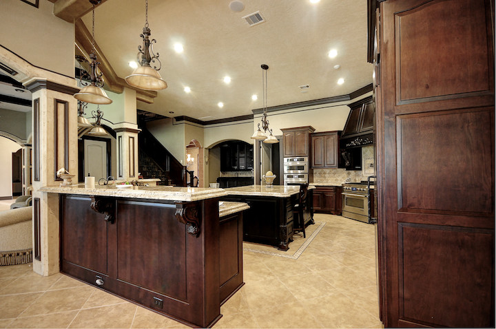 This is an example of a mediterranean kitchen in Houston.