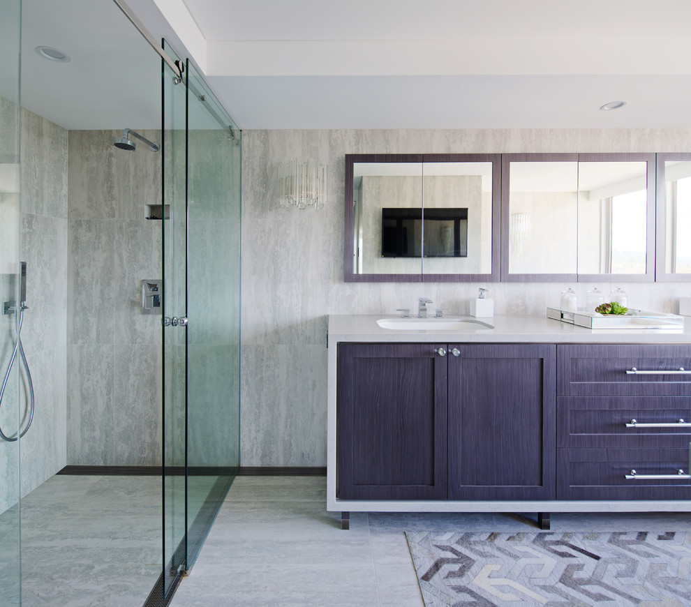 Photo of a large contemporary master bathroom in Sydney with shaker cabinets, medium wood cabinets, an undermount tub, a double shower, a bidet, gray tile, travertine, grey walls, travertine floors, an undermount sink, engineered quartz benchtops, grey floor and a sliding shower screen.