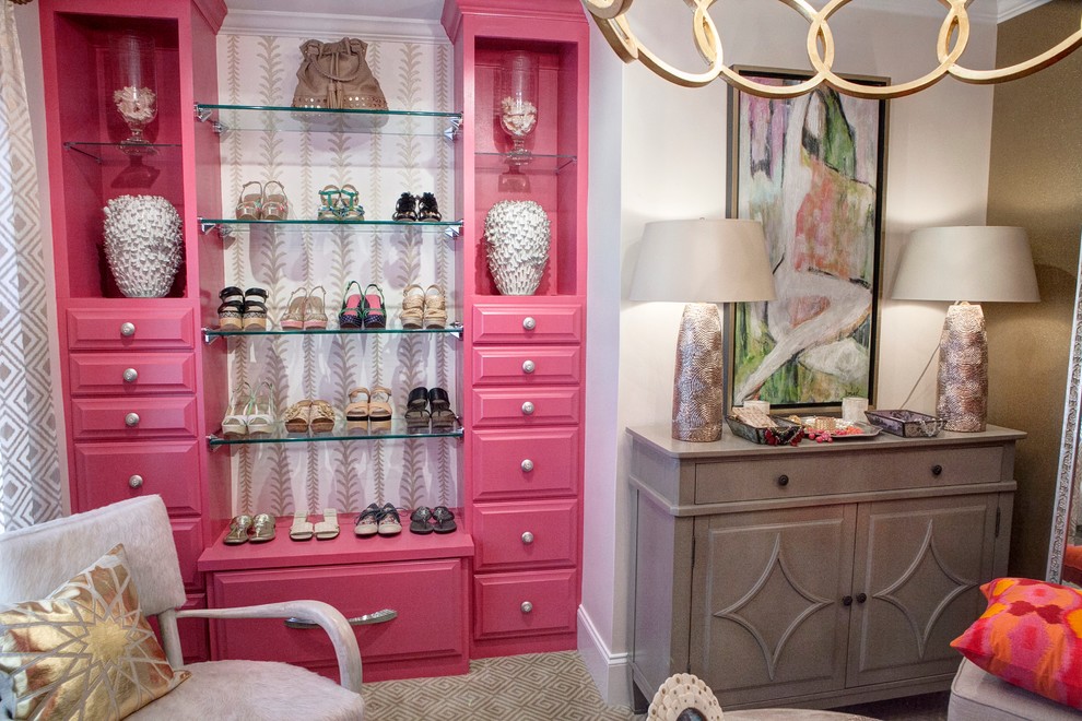 Mid-sized eclectic women's storage and wardrobe in Charleston with raised-panel cabinets, red cabinets and carpet.