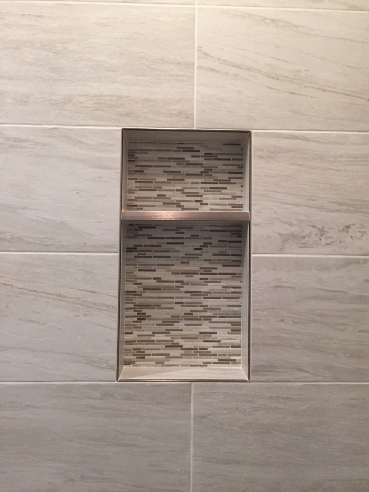 Inspiration for a mid-sized transitional master porcelain tile home design remodel in Chicago with raised-panel cabinets, gray cabinets, a two-piece toilet, an undermount sink and quartz countertops