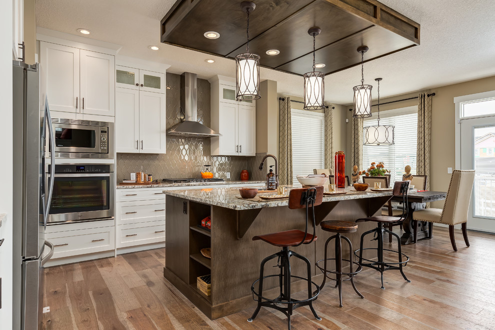 Example of a transitional kitchen design in Calgary with gray backsplash and glass tile backsplash