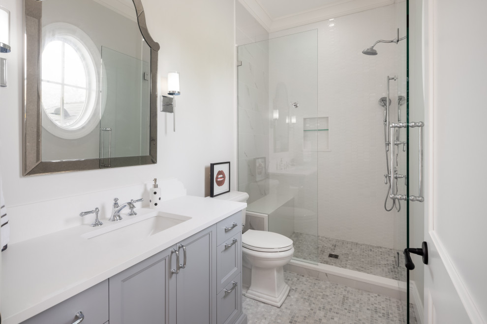 Design ideas for a mid-sized traditional master bathroom in Vancouver with a freestanding tub, a double shower, a one-piece toilet, white tile, ceramic tile, white walls, dark hardwood floors, a drop-in sink, brown floor, an open shower, a shower seat, a single vanity, wallpaper and wallpaper.