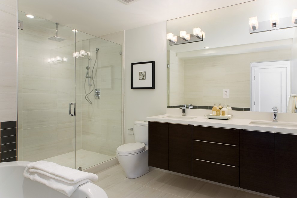 Photo of a contemporary bathroom in Other with an undermount sink, flat-panel cabinets, black cabinets, an alcove shower and beige tile.