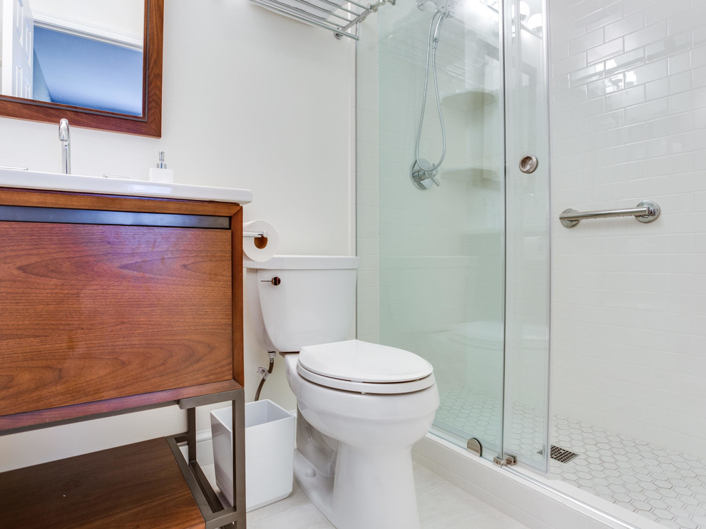 This is an example of a small midcentury bathroom in DC Metro.