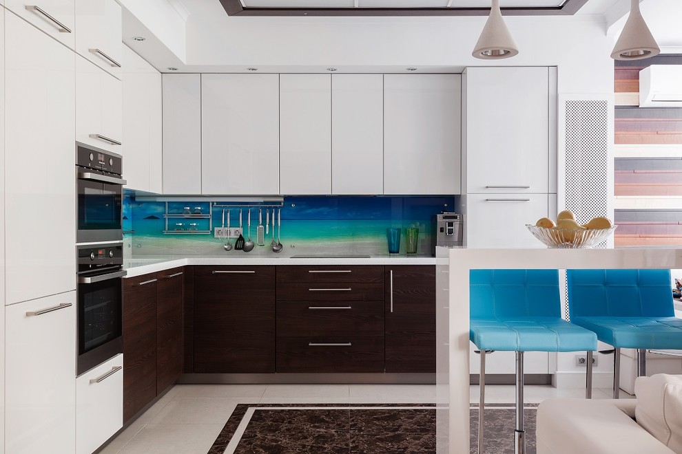 Inspiration for a contemporary l-shaped kitchen in Moscow with an integrated sink, flat-panel cabinets, dark wood cabinets, multi-coloured splashback, glass sheet splashback, stainless steel appliances and beige floor.