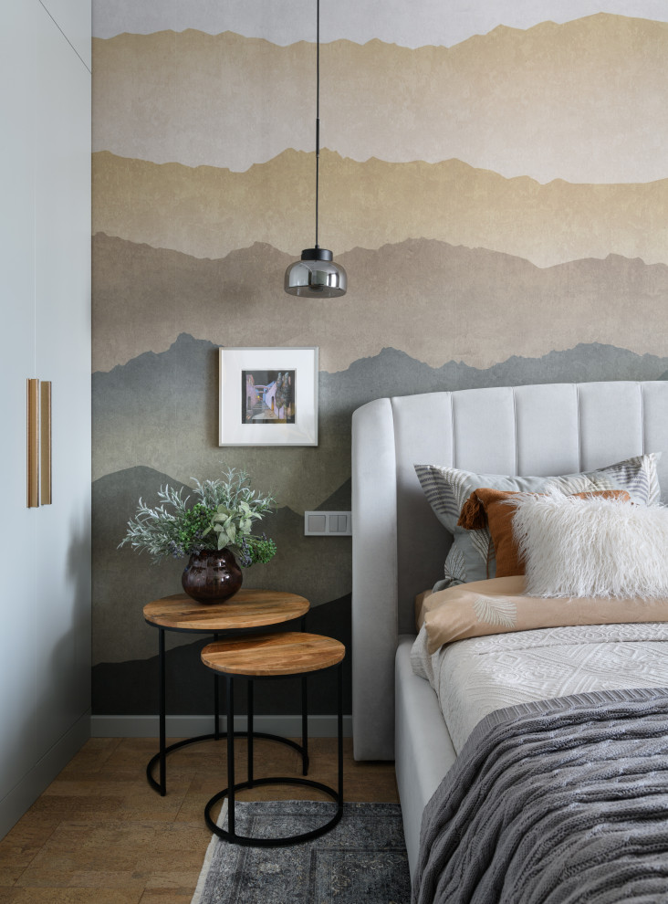 Inspiration for a medium sized contemporary master bedroom in Novosibirsk with grey walls, cork flooring, brown floors and a feature wall.
