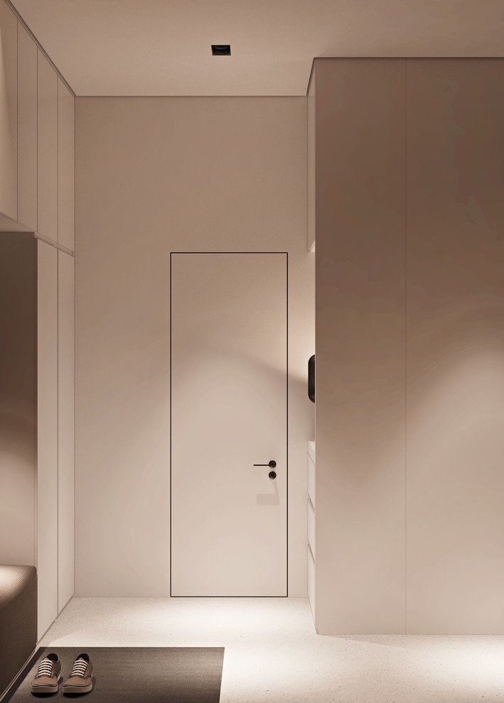 Photo of a mid-sized modern gender-neutral dressing room in Other with open cabinets, white cabinets, concrete floors and grey floor.
