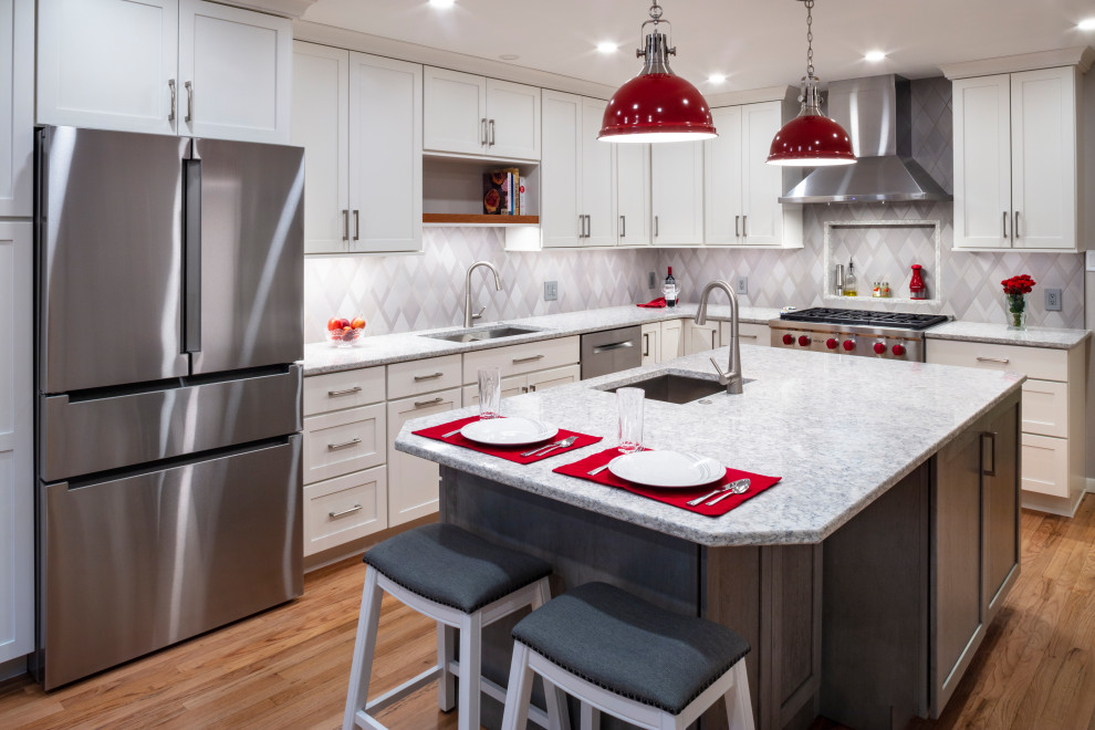 Inspiration for a transitional kitchen remodel with shaker cabinets, quartz countertops and stainless steel appliances