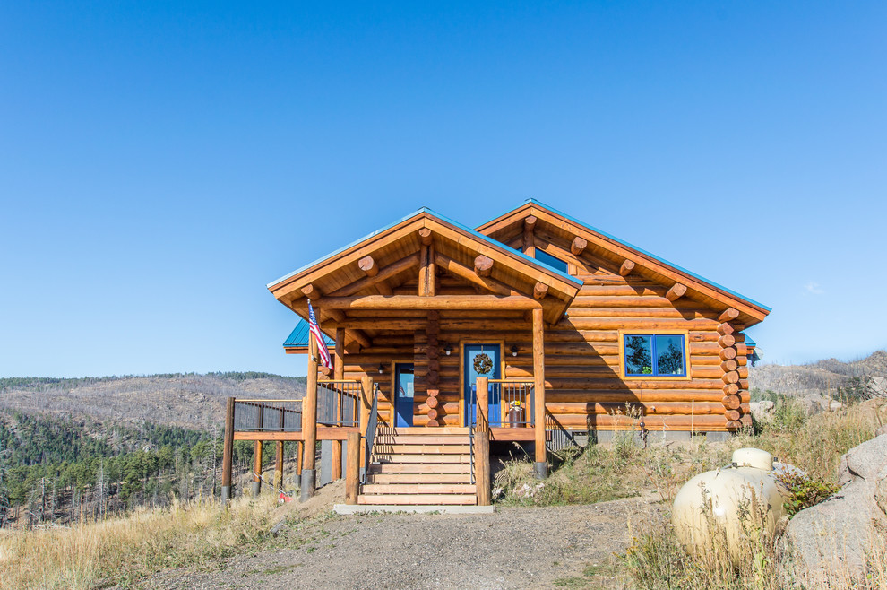 Inspiration for a rustic home design remodel in Denver