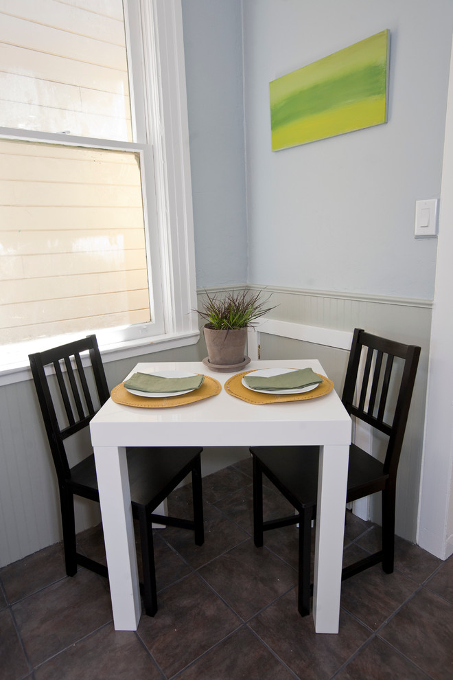 Example of a small transitional great room design in San Francisco with blue walls and no fireplace
