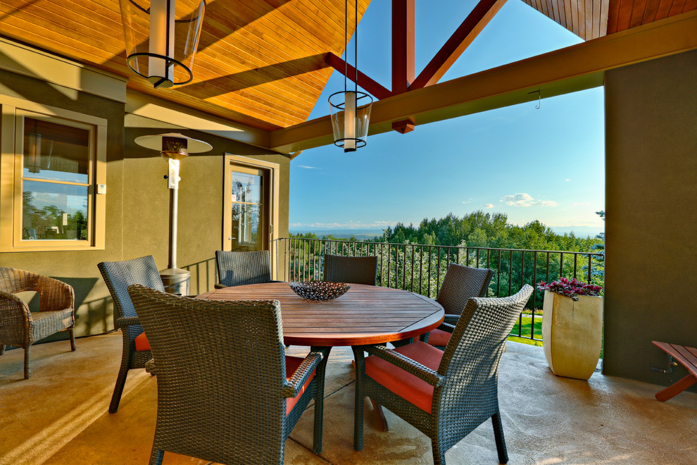 Inspiration for a traditional deck in Calgary with a roof extension.