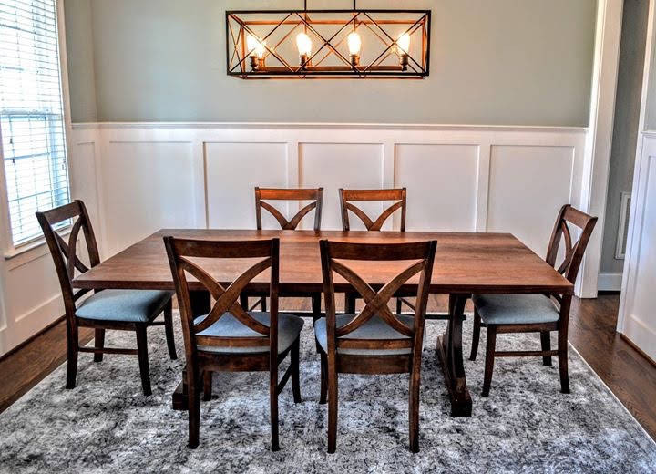 This is an example of a large contemporary dining room in Raleigh.