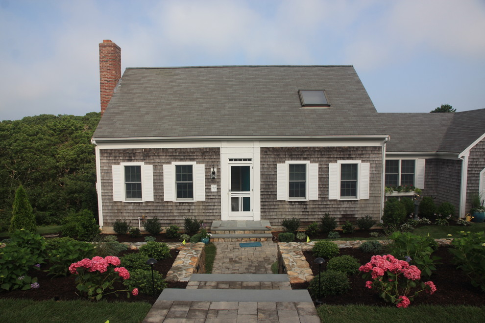 Small traditional two-storey exterior in Boston with wood siding.
