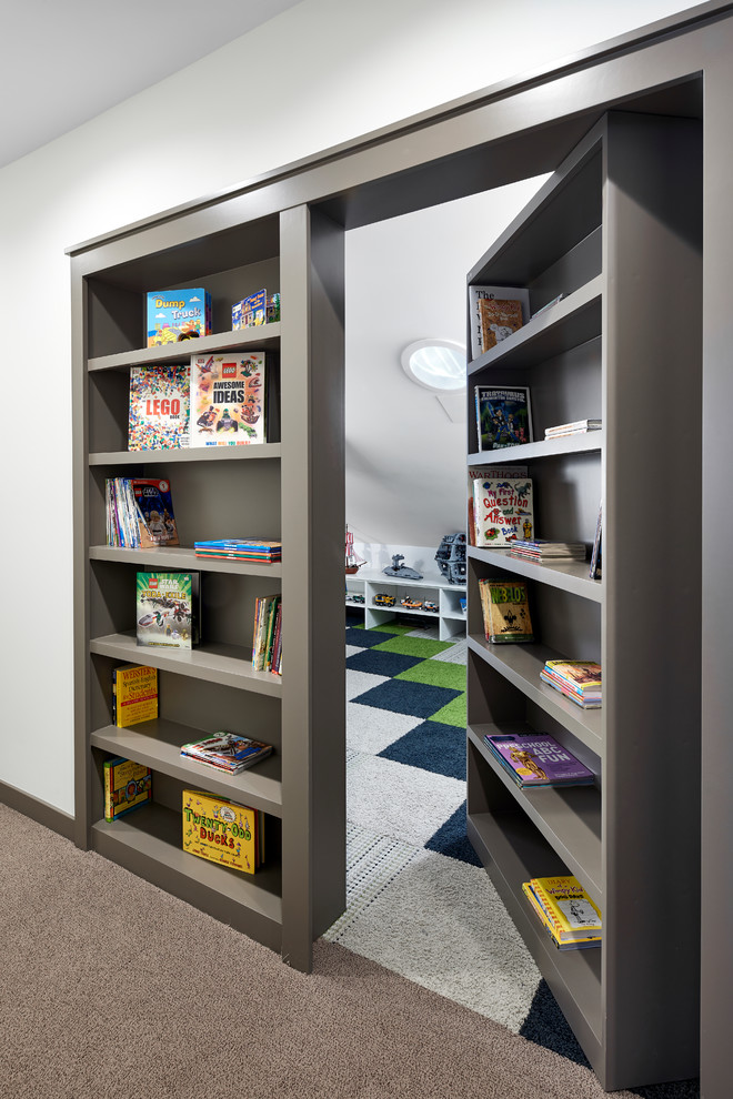 Photo of a large beach style gender-neutral kids' playroom for kids 4-10 years old in Minneapolis with white walls, carpet and multi-coloured floor.
