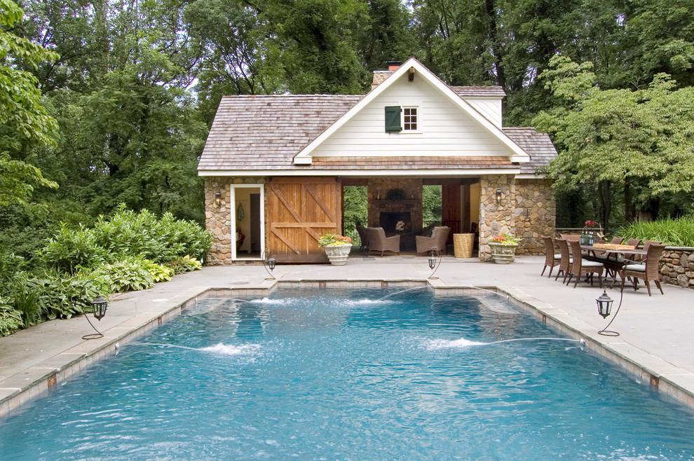 Inspiration for a traditional pool in Philadelphia with a pool house.