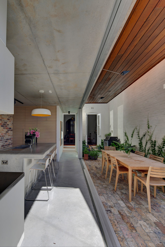 Photo of a contemporary kitchen in Sydney with with island.