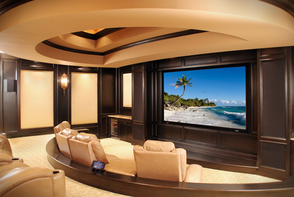 Design ideas for a mediterranean home theatre in Cleveland with a projector screen and beige floor.