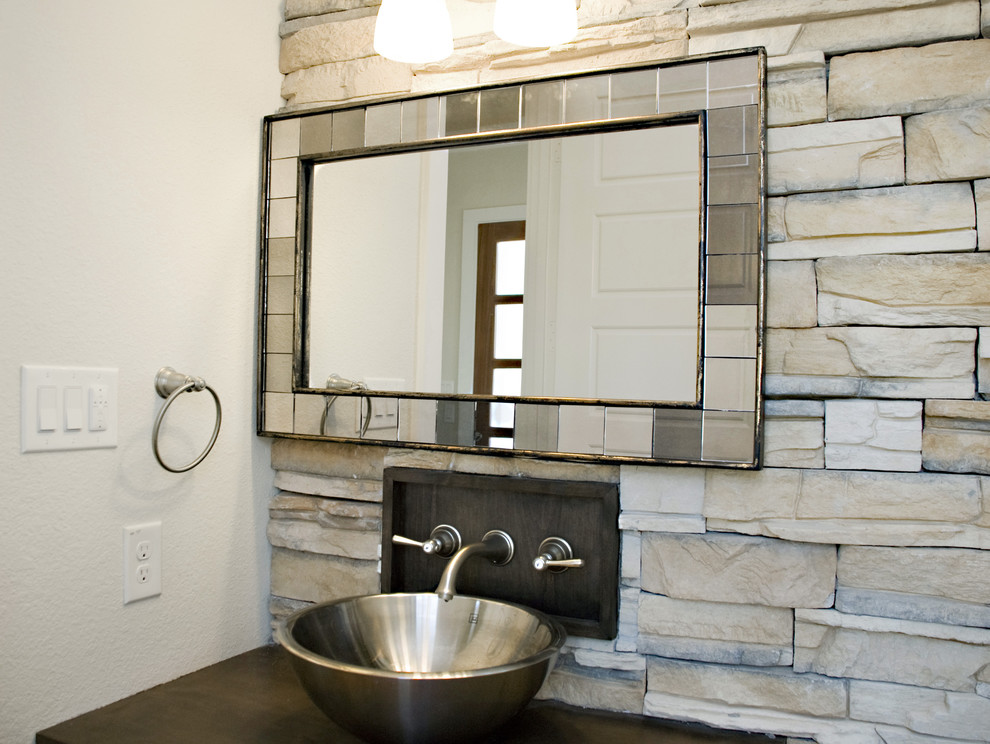 This is an example of a contemporary bathroom in Dallas with a vessel sink.