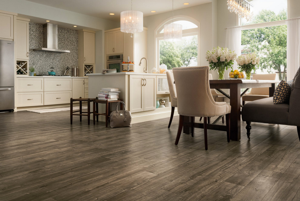 Eat-in kitchen - transitional l-shaped dark wood floor eat-in kitchen idea with shaker cabinets, white cabinets, quartz countertops, multicolored backsplash, mosaic tile backsplash, stainless steel appliances and an island