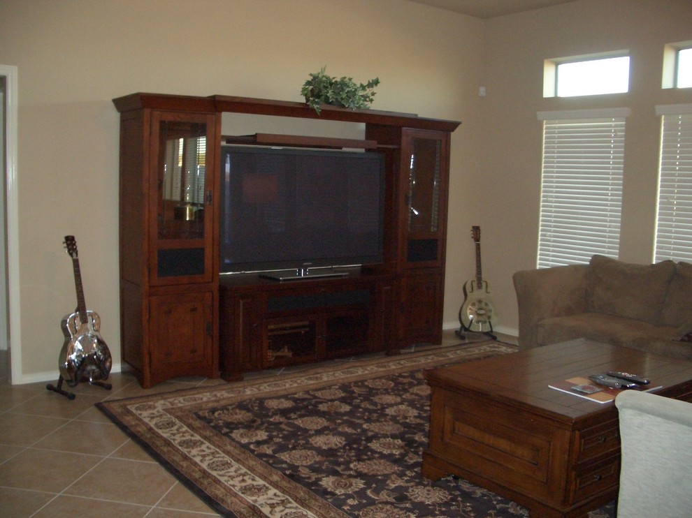 How do I decorate above an entertainment unit?