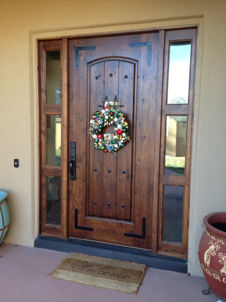 Mountain style entryway photo in Denver