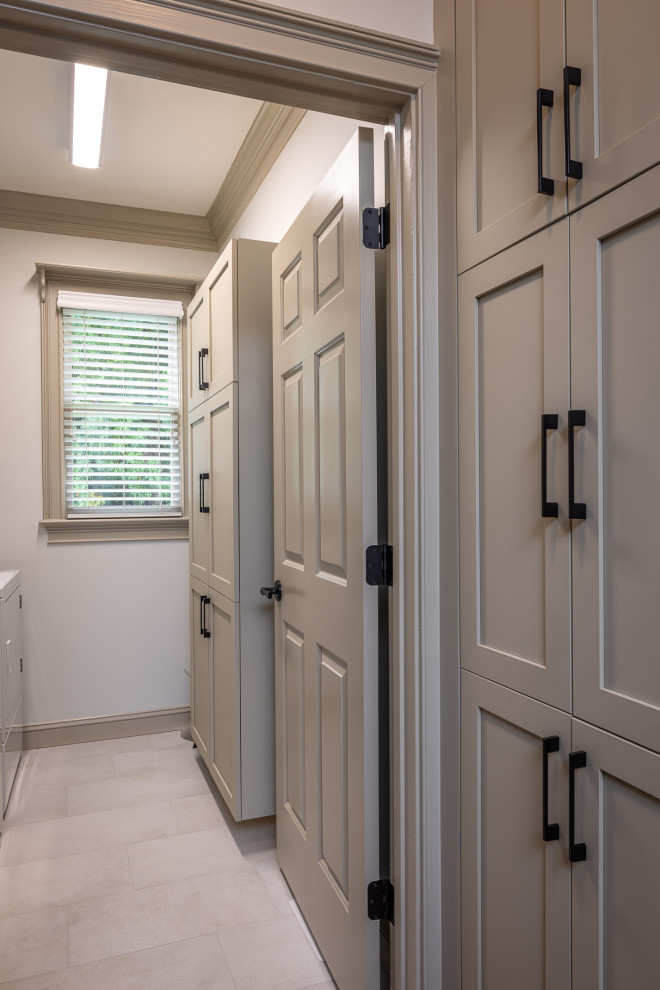 Transitional laundry room photo in Raleigh