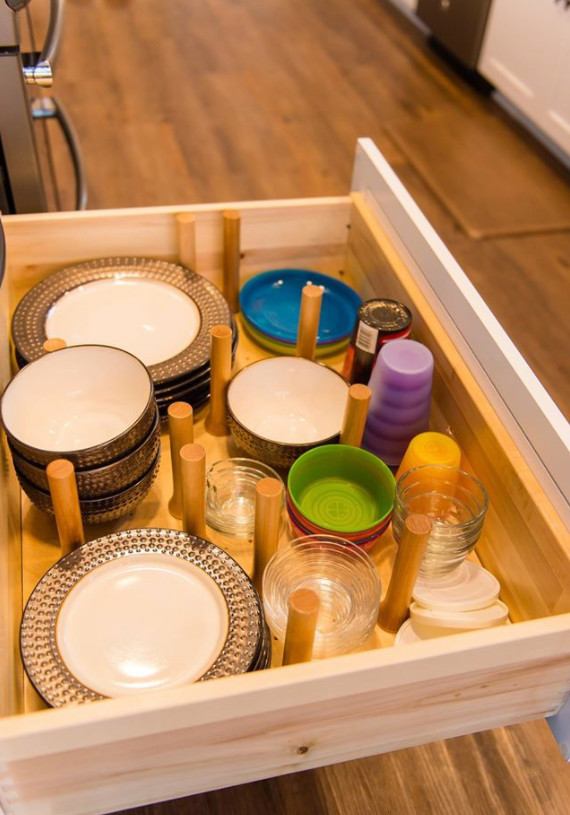 Inspiration for a mid-sized transitional galley medium tone wood floor and brown floor eat-in kitchen remodel with an undermount sink, shaker cabinets, white cabinets, marble countertops, metallic backsplash, mosaic tile backsplash, stainless steel appliances and a peninsula